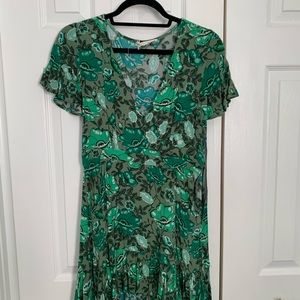Adorable green dress with ruffle hem. Purchased at a boutique in Australia. Sm.